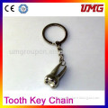 Yellow metal tooth key chain gifts for dentists